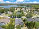 Lakefront community aerial view showcasing a beautiful home in lush natural setting at 5335 Bay Side Dr, Orlando, FL 32819