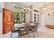 Formal dining area with large windows offering an abundance of natural light at 5335 Bay Side Dr, Orlando, FL 32819