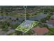 Aerial view of property showcasing the home, pool, backyard, and lake at 5944 Lake Melrose Dr, Orlando, FL 32829