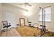 Home gym with weight machine, mirror, weights, and workout bench at 5944 Lake Melrose Dr, Orlando, FL 32829