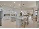 Spacious kitchen with granite countertops, stylish islands, and seamless flow to the living area at 5944 Lake Melrose Dr, Orlando, FL 32829