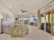 Bright living room with a fireplace and sliding glass doors to the outdoor area at 5944 Lake Melrose Dr, Orlando, FL 32829