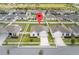 Aerial view of home showcasing its curb appeal and well-manicured lawn at 601 Watusi Way, St Cloud, FL 34772