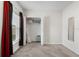 Bedroom featuring a window, closet with open doors, and carpet floors at 601 Watusi Way, St Cloud, FL 34772