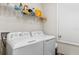 Laundry room equipped with a washing machine and a dryer at 601 Watusi Way, St Cloud, FL 34772