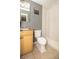 Bathroom featuring a light wood vanity, granite countertop, and a tub with shower at 610 Heatherton Vlg # 610, Altamonte Springs, FL 32714