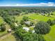 Expansive aerial view of the property, showcasing pastures and surrounding greenery at 750 Sw 91St Pl, Ocala, FL 34476