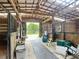 Interior of a horse stable, showing stalls, rustic wood framing, and plenty of space for equestrian activities at 750 Sw 91St Pl, Ocala, FL 34476