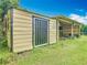Exterior view of a storage building, providing space for tools, equipment, and storage of items at 750 Sw 91St Pl, Ocala, FL 34476