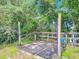 Outdoor horse wash rack with wooden posts, providing an open-air grooming and cleaning area at 750 Sw 91St Pl, Ocala, FL 34476