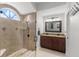 Bathroom with a shower, double vanity, and granite countertop at 801 Hunt Dr, Lake Wales, FL 33853