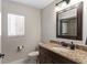Bathroom featuring granite counters and modern fixtures at 801 Hunt Dr, Lake Wales, FL 33853