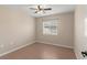 Bedroom with a window and wood-look flooring at 801 Hunt Dr, Lake Wales, FL 33853