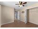 Bedroom with ceiling fan, closet and wood-look flooring at 801 Hunt Dr, Lake Wales, FL 33853