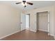 Bedroom with a ceiling fan and closet at 801 Hunt Dr, Lake Wales, FL 33853