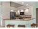 Modern kitchen featuring granite countertops, stainless steel appliances, and ample cabinet space at 801 Hunt Dr, Lake Wales, FL 33853