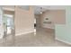 Open-concept layout connecting the living room with high ceiling and adjacent rooms at 801 Hunt Dr, Lake Wales, FL 33853
