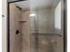 Modern shower with glass door and black hardware at 801 Hunt Dr, Lake Wales, FL 33853