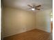 Empty bedroom featuring laminate floors, a ceiling fan, and white walls at 916 Great Bend Rd, Altamonte Springs, FL 32714