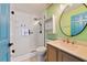 Updated bathroom featuring glass shower, modern vanity, and bright accents at 925 S Dean Cir, Deltona, FL 32738