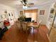 Bright dining room with tile flooring, a window and a table set for six, perfect for Gathering meals at 5723 Harcourt Ave, Orlando, FL 32810