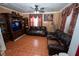 The warm and inviting living room is perfect for relaxing or entertaining at 5723 Harcourt Ave, Orlando, FL 32810