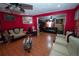 Spacious living room boasts unique decor and ample seating, great for entertaining at 5723 Harcourt Ave, Orlando, FL 32810