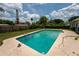 Backyard featuring a private pool, patio area surrounded by lush greenery at 5723 Harcourt Ave, Orlando, FL 32810