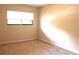 This carpeted bedroom features a window and plenty of light at 104 Oaks Ct, Sanford, FL 32771