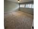 Spacious bedroom featuring carpeted floors and large windows at 104 Oaks Ct, Sanford, FL 32771