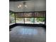 Enclosed patio with tile flooring and beautiful backyard views at 104 Oaks Ct, Sanford, FL 32771