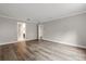 Bedroom featuring hardwood floors, white trim and two entryways at 1203 Stone Harbour Rd, Winter Springs, FL 32708