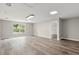 Bonus room with a large window, hardwood floors and recessed lighting at 1203 Stone Harbour Rd, Winter Springs, FL 32708