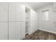 Spacious closet featuring custom white cabinets and shelving for storage at 1203 Stone Harbour Rd, Winter Springs, FL 32708