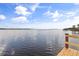 Panoramic lake view from the wood dock with red trim at 1203 Stone Harbour Rd, Winter Springs, FL 32708