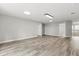 Spacious living room with wood flooring and recessed lighting at 1203 Stone Harbour Rd, Winter Springs, FL 32708