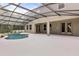 Outdoor pool with screened enclosure and patio at 1203 Stone Harbour Rd, Winter Springs, FL 32708