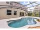 Screen-enclosed outdoor pool and patio area, ideal for entertaining or relaxing in a private setting at 1203 Stone Harbour Rd, Winter Springs, FL 32708