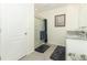 Bathroom featuring a shower, granite counters, and neutral decor at 1313 Middle Lake Dr, Ormond Beach, FL 32174