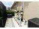Pool equipment including filter and heater in fenced in backyard at 1313 Middle Lake Dr, Ormond Beach, FL 32174