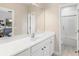Bright bathroom with a large mirror and modern fixtures at 14126 Walcott Ave, Orlando, FL 32827