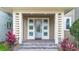 Inviting front entrance with decorative columns and stylish door at 14126 Walcott Ave, Orlando, FL 32827
