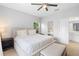 Cozy bedroom with a large bed, soft pillows, and a comfortable bench at 14126 Walcott Ave, Orlando, FL 32827
