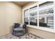 Cozy patio features brick floors, comfortable seating, and view of living room at 14126 Walcott Ave, Orlando, FL 32827