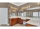 Charming bathroom with dual sinks, tile floor, and shower with glass block window at 14312 Paradise Tree Dr, Orlando, FL 32828