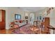 Bright living room with hardwood floors, comfortable seating, and an open floor plan at 14312 Paradise Tree Dr, Orlando, FL 32828