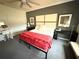 Bright main bedroom with neutral walls, a large bed, and modern decor at 14344 Desert Haven St, Windermere, FL 34786