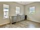 Bar area with sink, stainless steel dishwasher, cabinetry and space for wine cooler at 148 Hampton Loop, Davenport, FL 33837