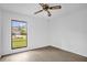 Bedroom featuring laminate floors and view from window at 1508 Southwind Ct, Casselberry, FL 32707