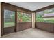 Screened-in patio provides a view of the lush backyard at 1508 Southwind Ct, Casselberry, FL 32707
